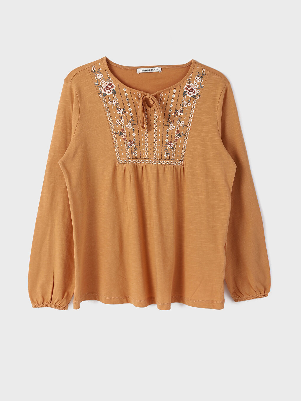 بلوزة كم طويل مطبوعة بياقة مربوطة للسيدات