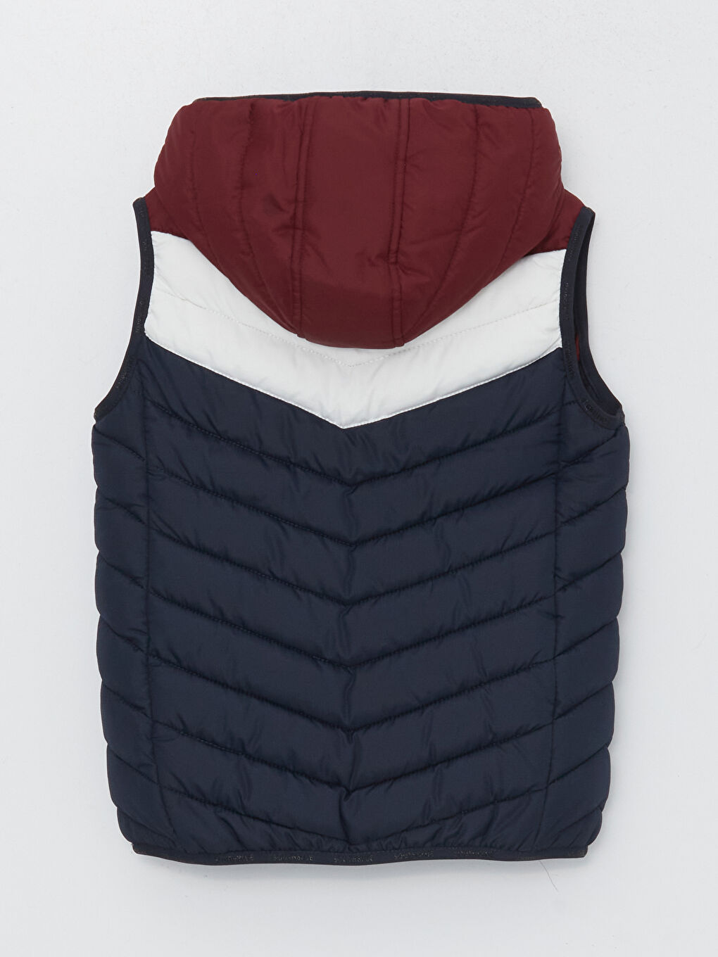 Капюшонды түрлі-түсті балаға арналған үрмелі жилет-1