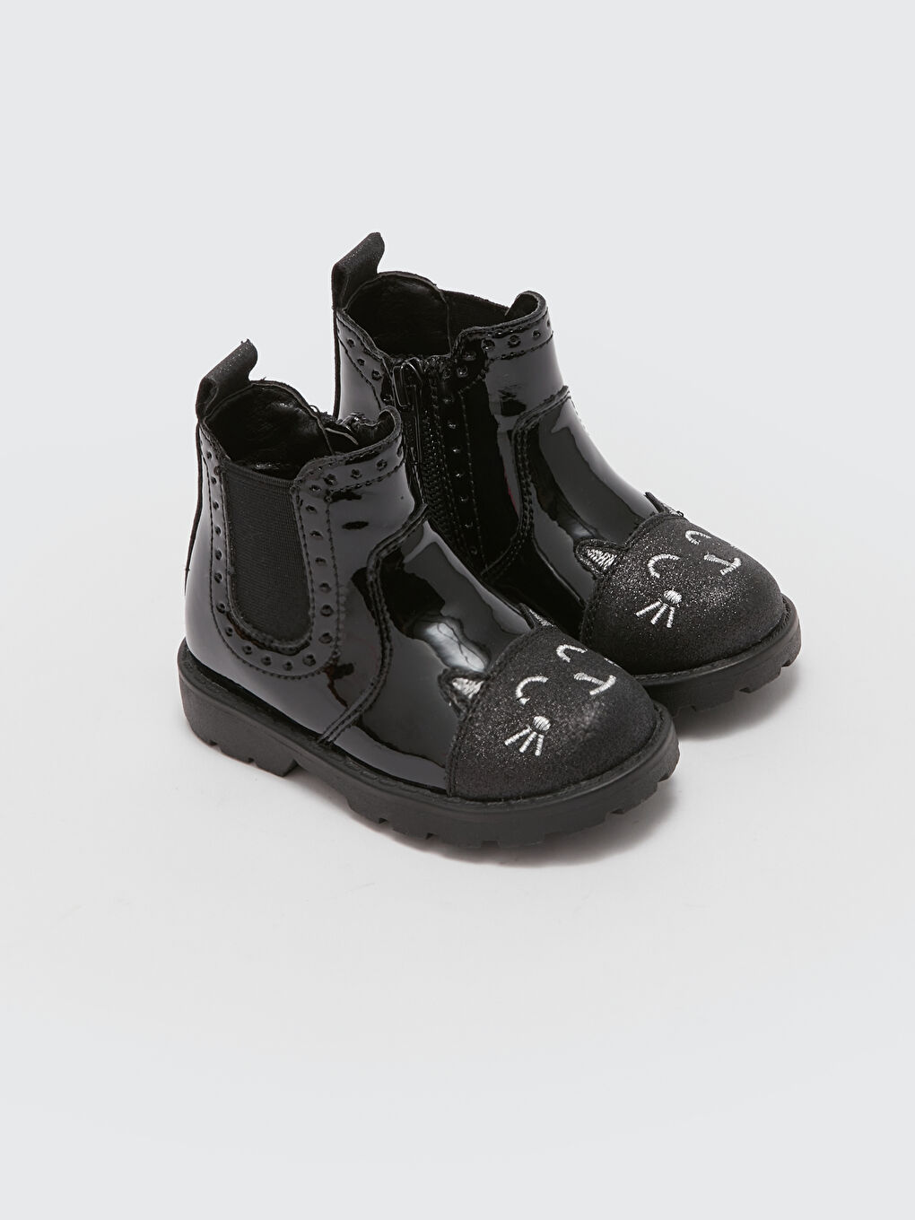 Siyah Deri Görünümlü Kız Bebek Bot