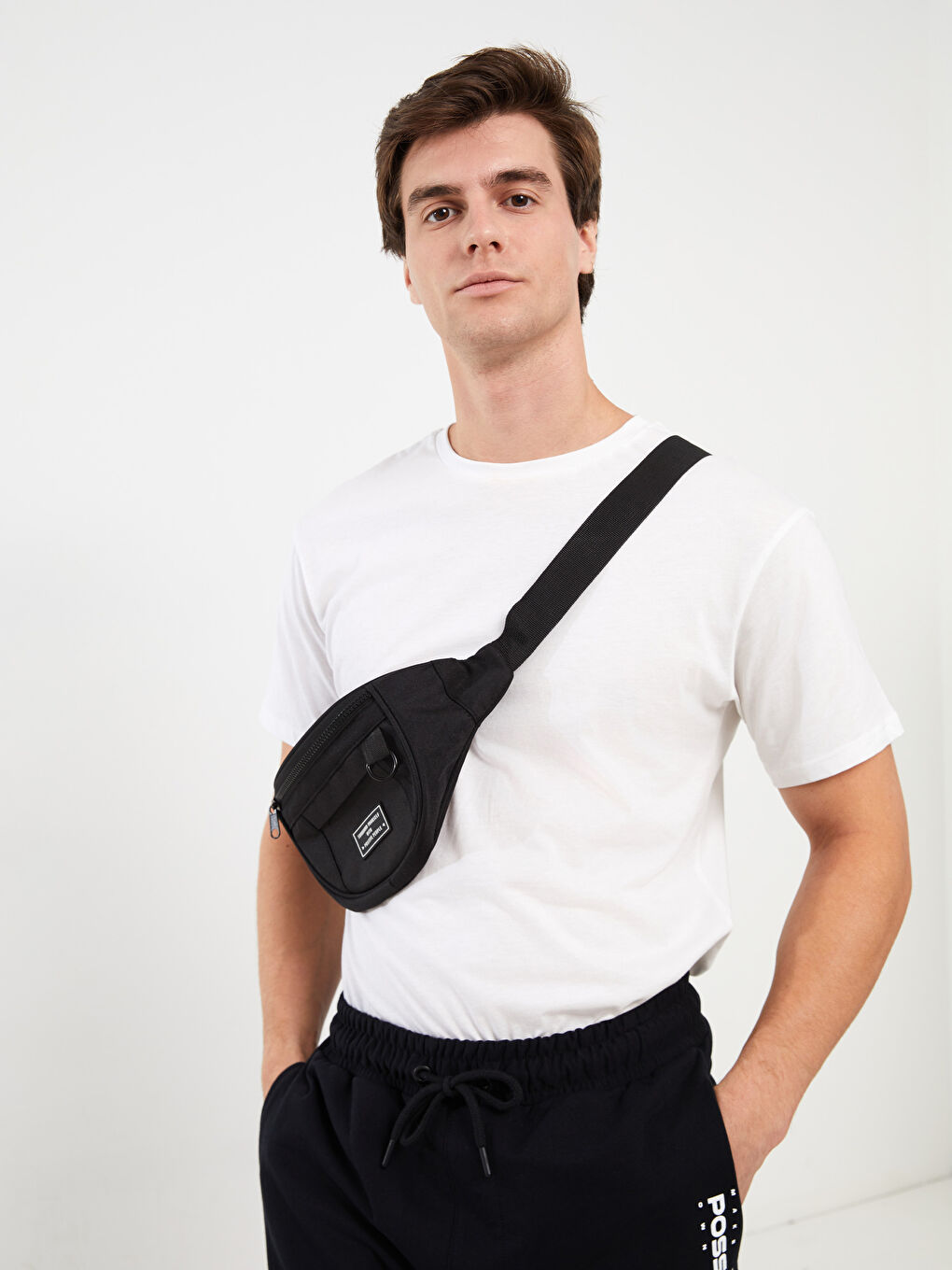 ლეიბლის დეტალური მამაკაცის წელის ჩანთა-1