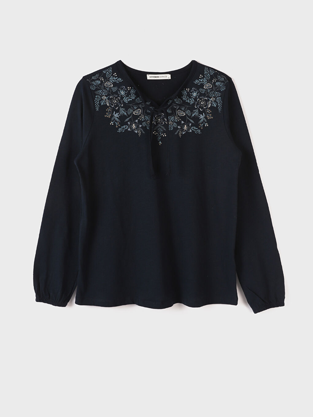 بلوزة كم طويل مطرزة بياقة دائرية للسيدات