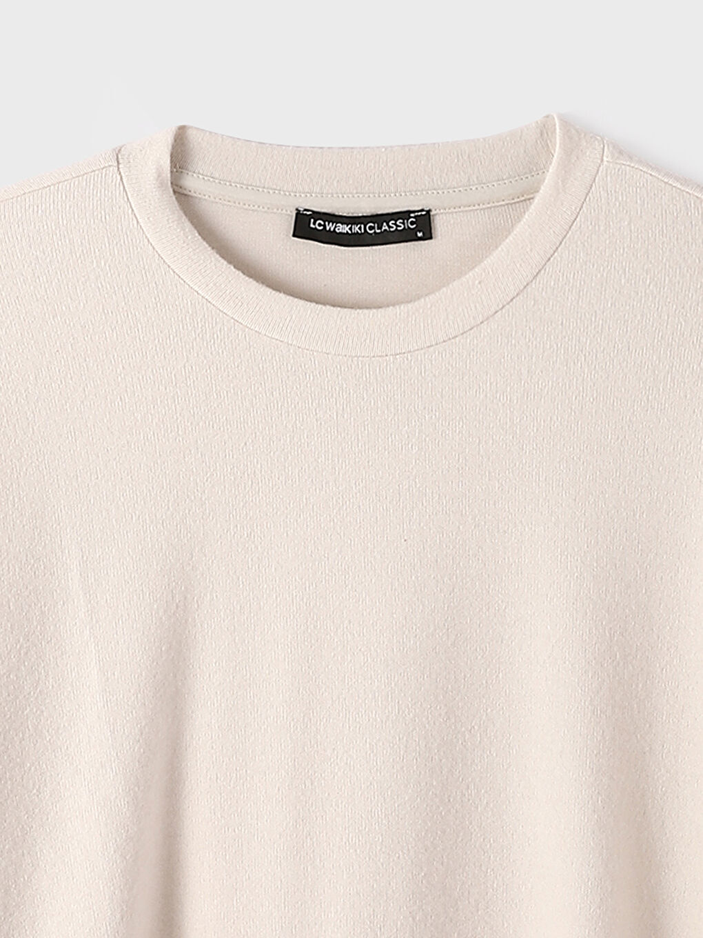 بلوفر تريكو كم طويل بياقة دائرية للرجال-1