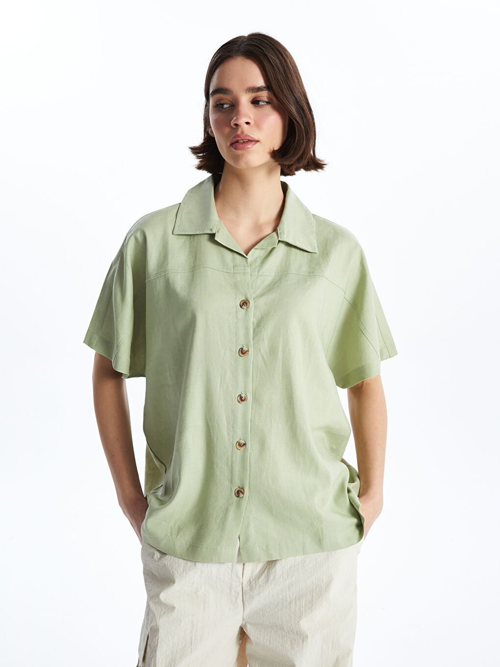 Әйелдерге арналған зығыр қоспасы қысқа жең өрнексіз оверсайз жейде