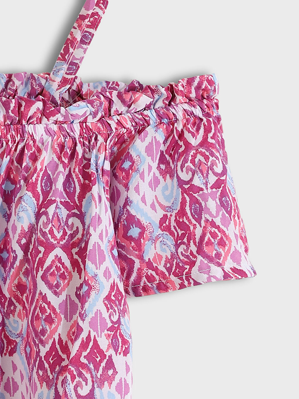 بلوزة قص للبنات بياقة سلاش منقوشة-2