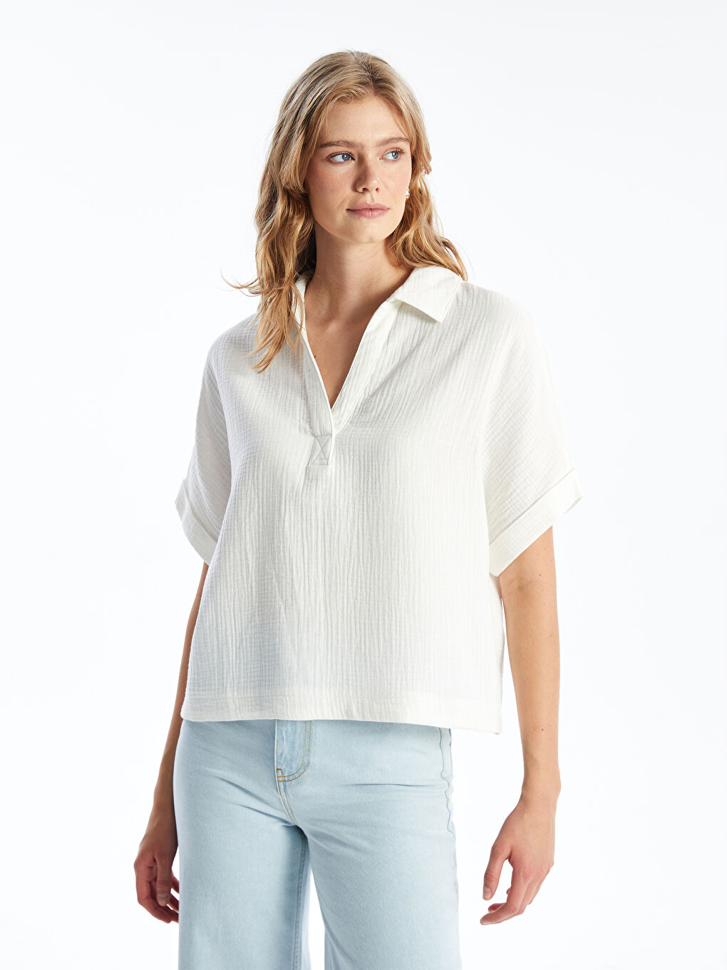 بلوزة ياقة بولو سادة كم قصير أوفراسايز للسيدات