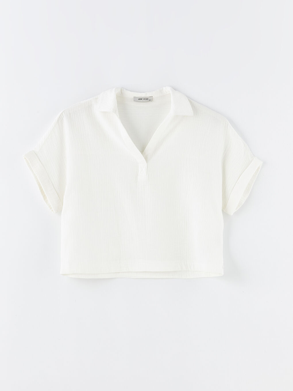 بلوزة ياقة بولو سادة كم قصير أوفراسايز للسيدات-6