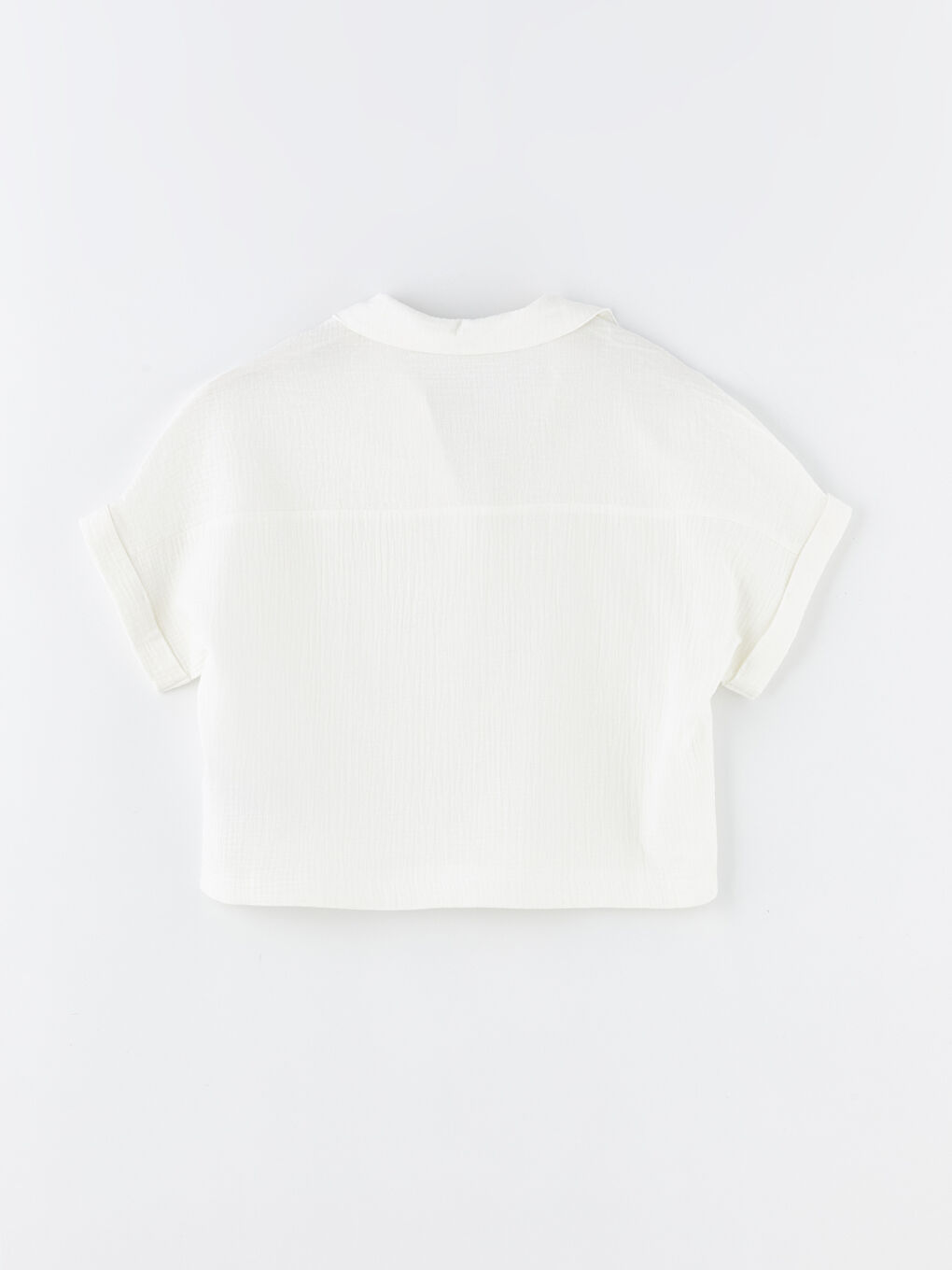 بلوزة ياقة بولو سادة كم قصير أوفراسايز للسيدات-7