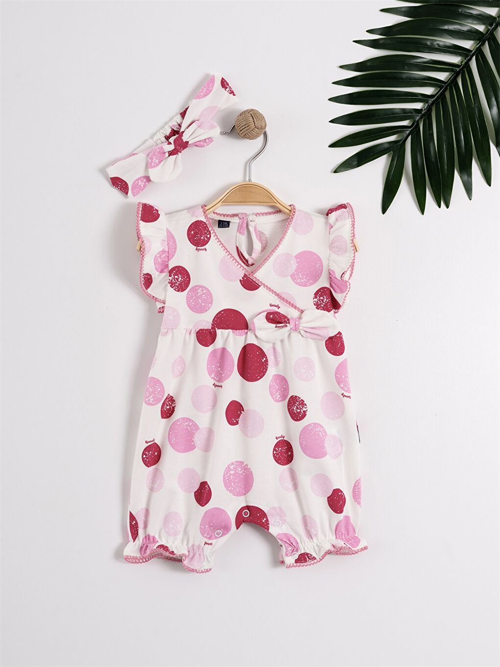 Pembe Saç Bantlı Kız Bebek Tulum