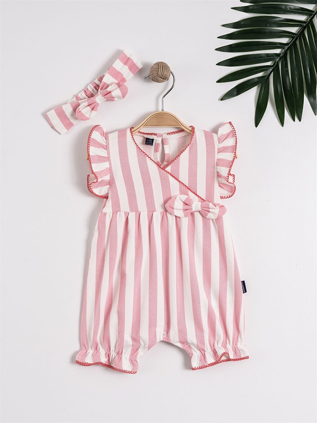 Pembe Saç Bantlı Kız Bebek Tulum