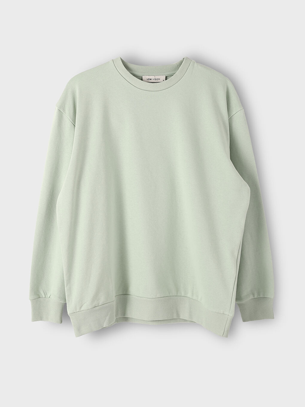 سويت شيرت واسع بياقة دائرية للسيدات