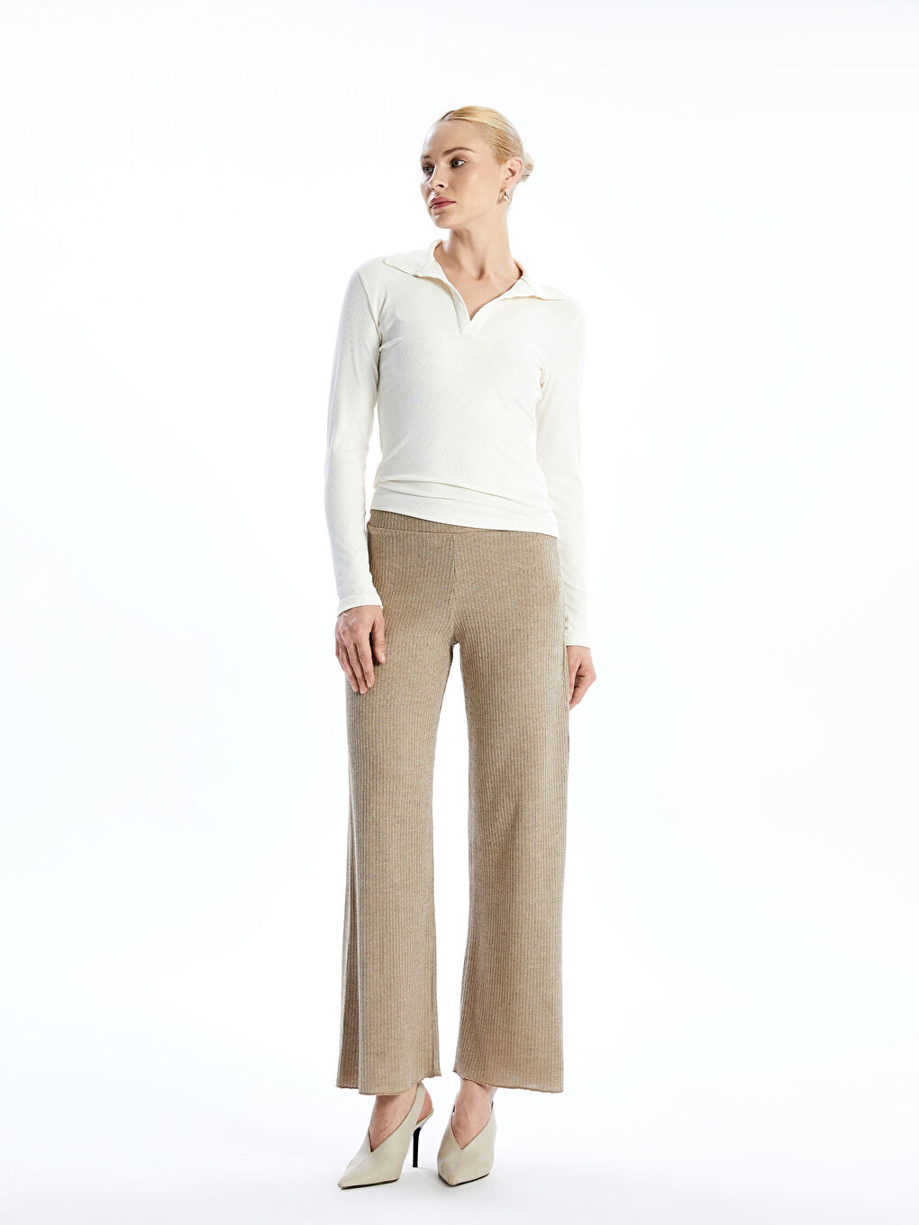 Bej Beli Lastikli Parlak Görünümlü Kadın Triko Pantolon