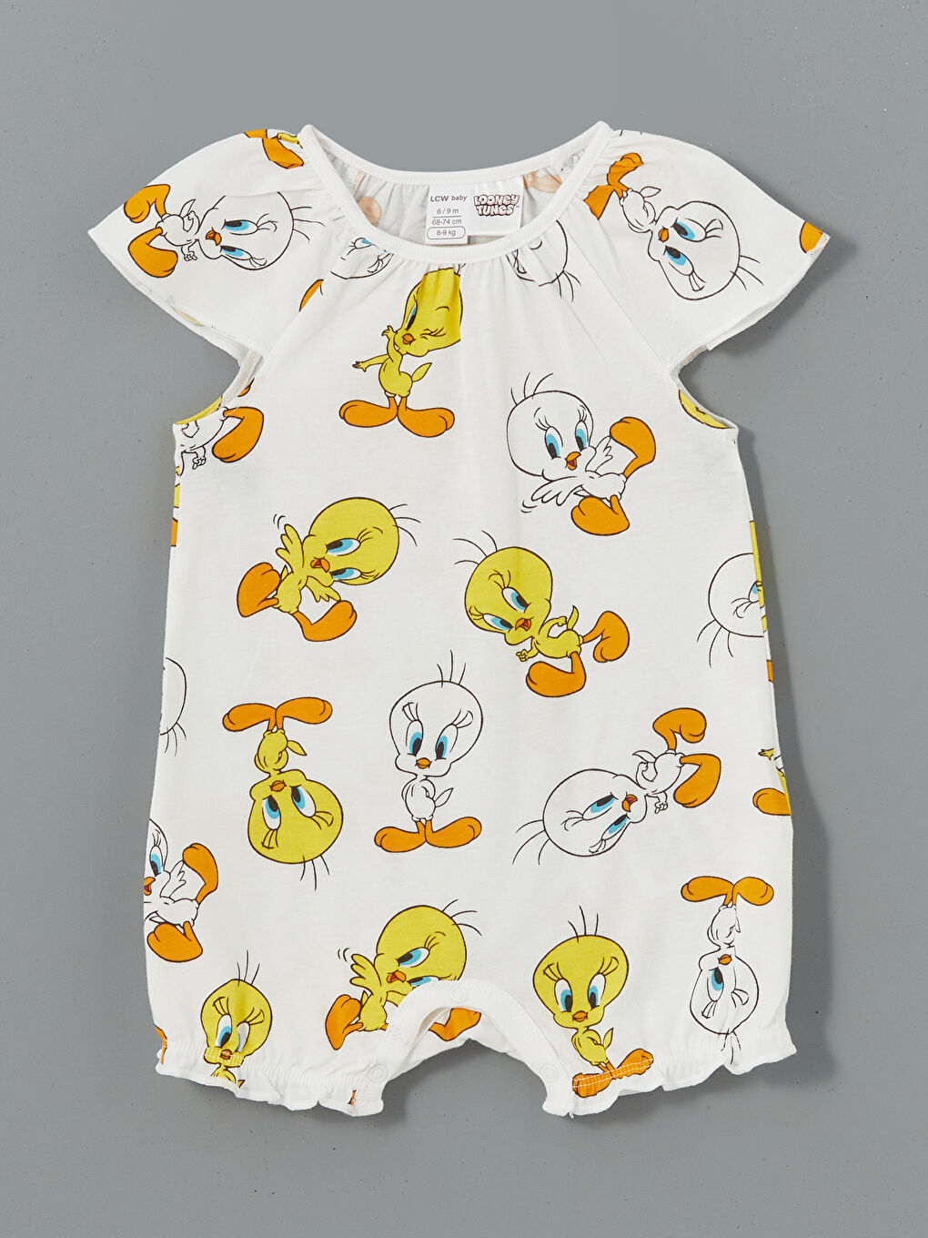 Bej Bisiklet Yaka Tweety Baskılı Kız Bebek Tulum