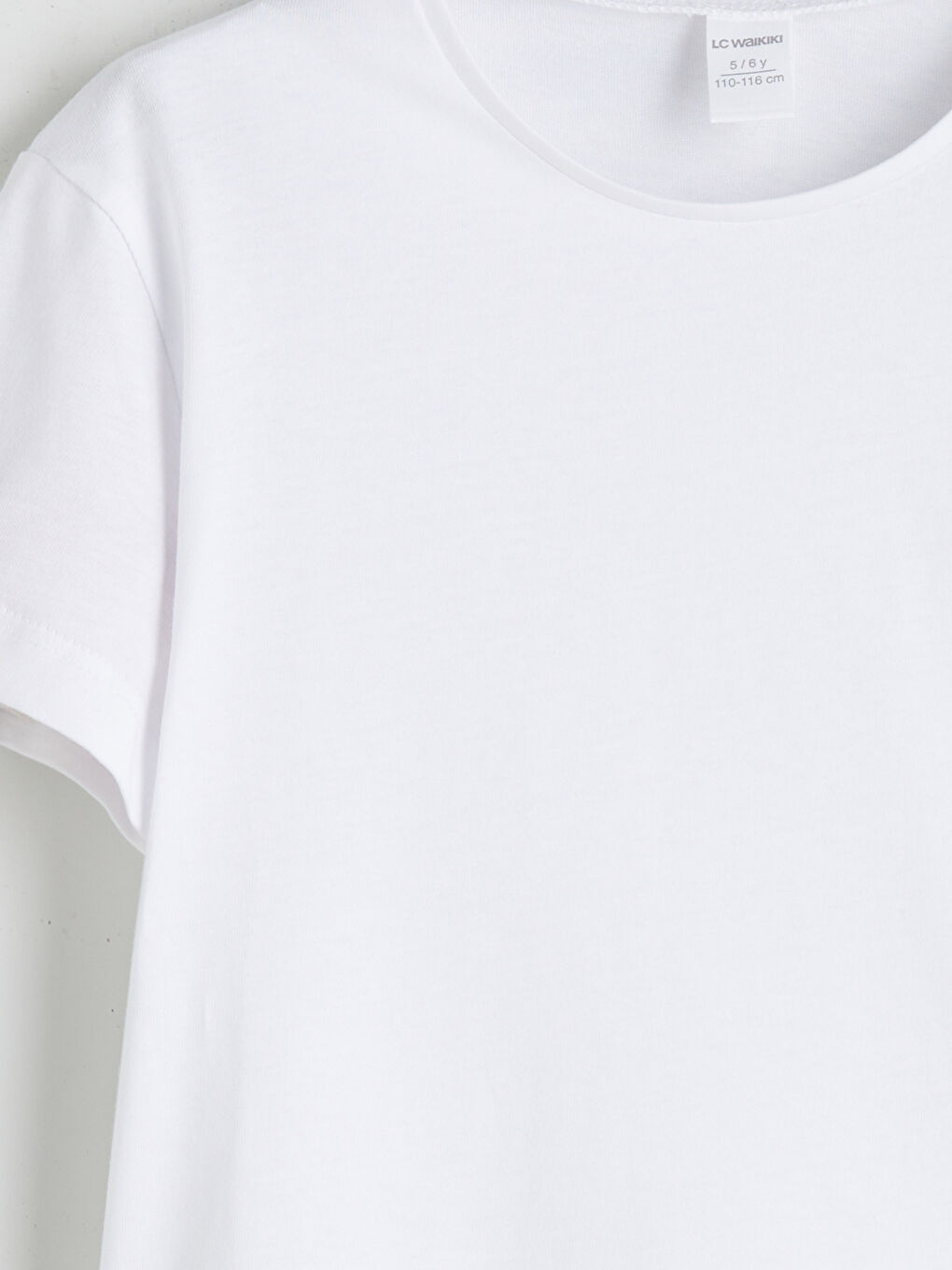 تیشێرتی کچانەی سادەی یەخە خڕ-2