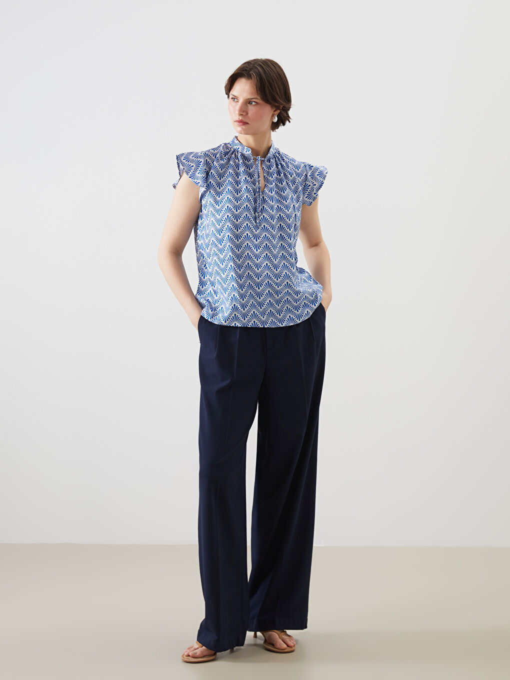 Tie Neck Patterned Ruffled Blouse-1