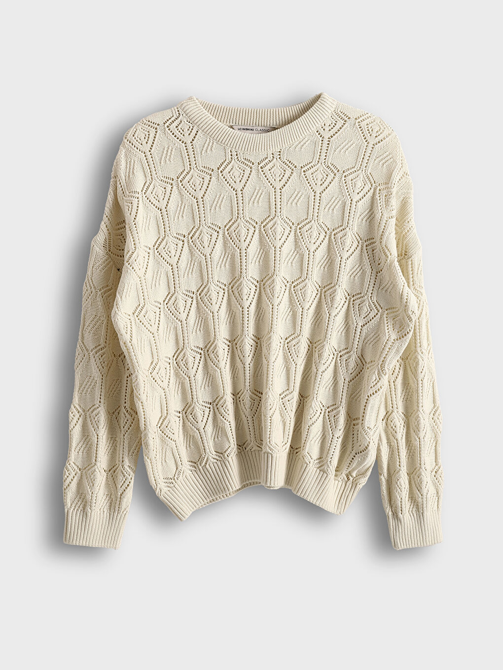 ქალის აჟურული სვიტერი მრგვალი ყელით-4