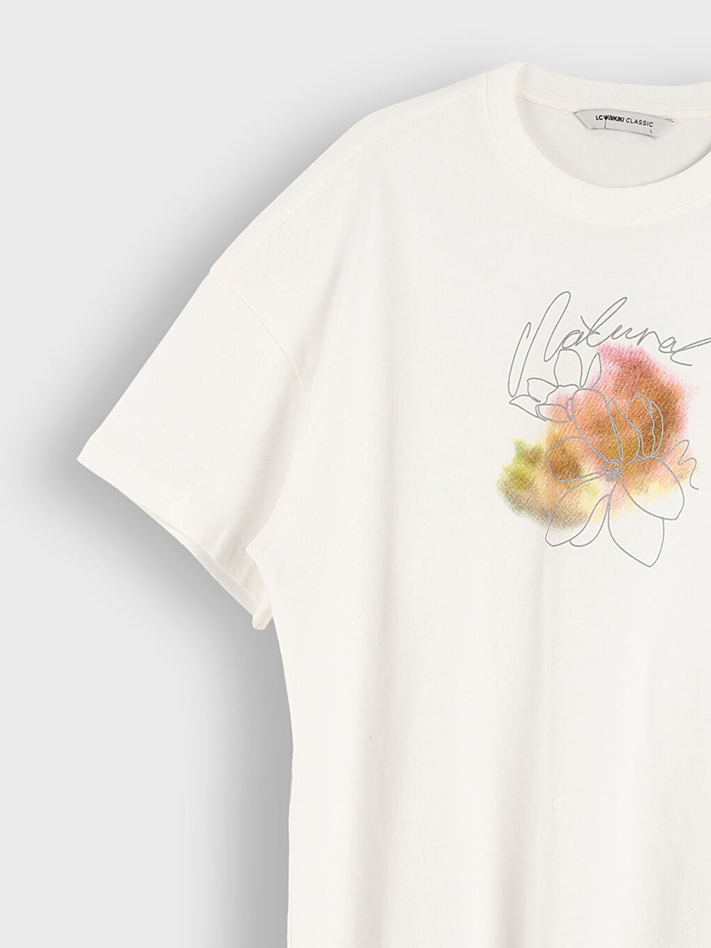 تيشيرت نسائي واسع مطبوع بياقة دائرية-7