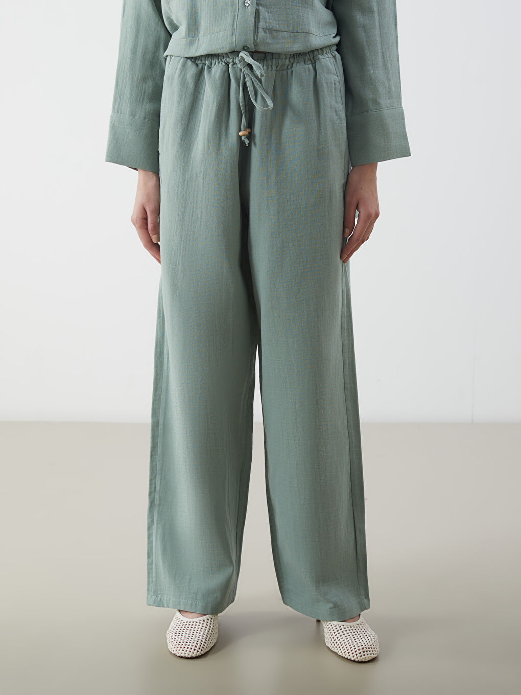 Yeşil Beli Lastikli Geniş Paça Müslin Kadın Pantolon-1