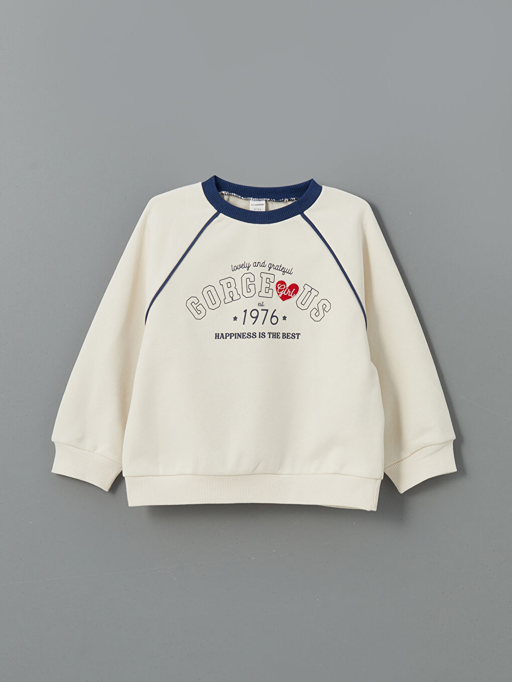 سێتی سوێت‌شێرت و پانتۆڵی تراکسوت چاپکراو بۆ کچان ٢ دانە-1