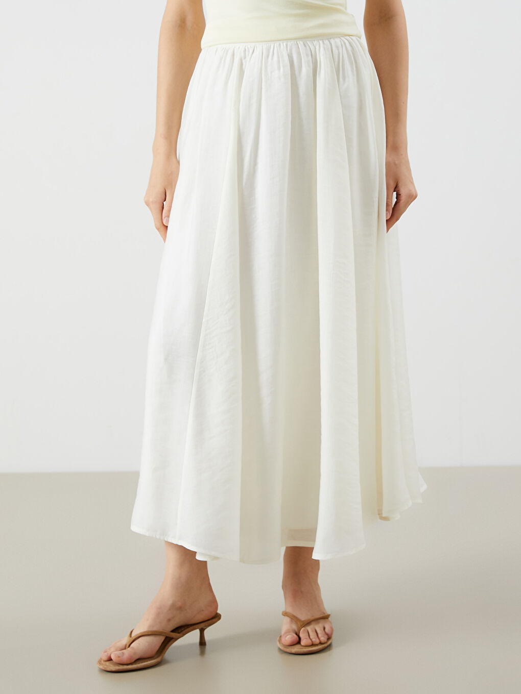 Ekru Beli Lastikli Pileli Etek-1