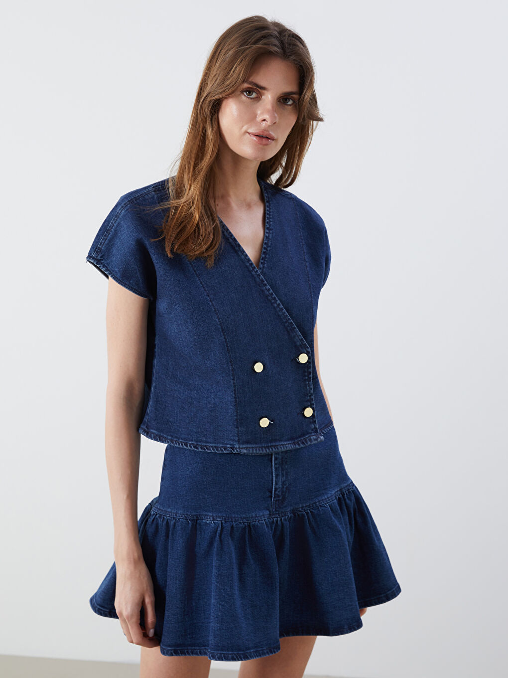 جلیقەی جینزی ژنانی کڕۆپی یاخە کڕوڤاز