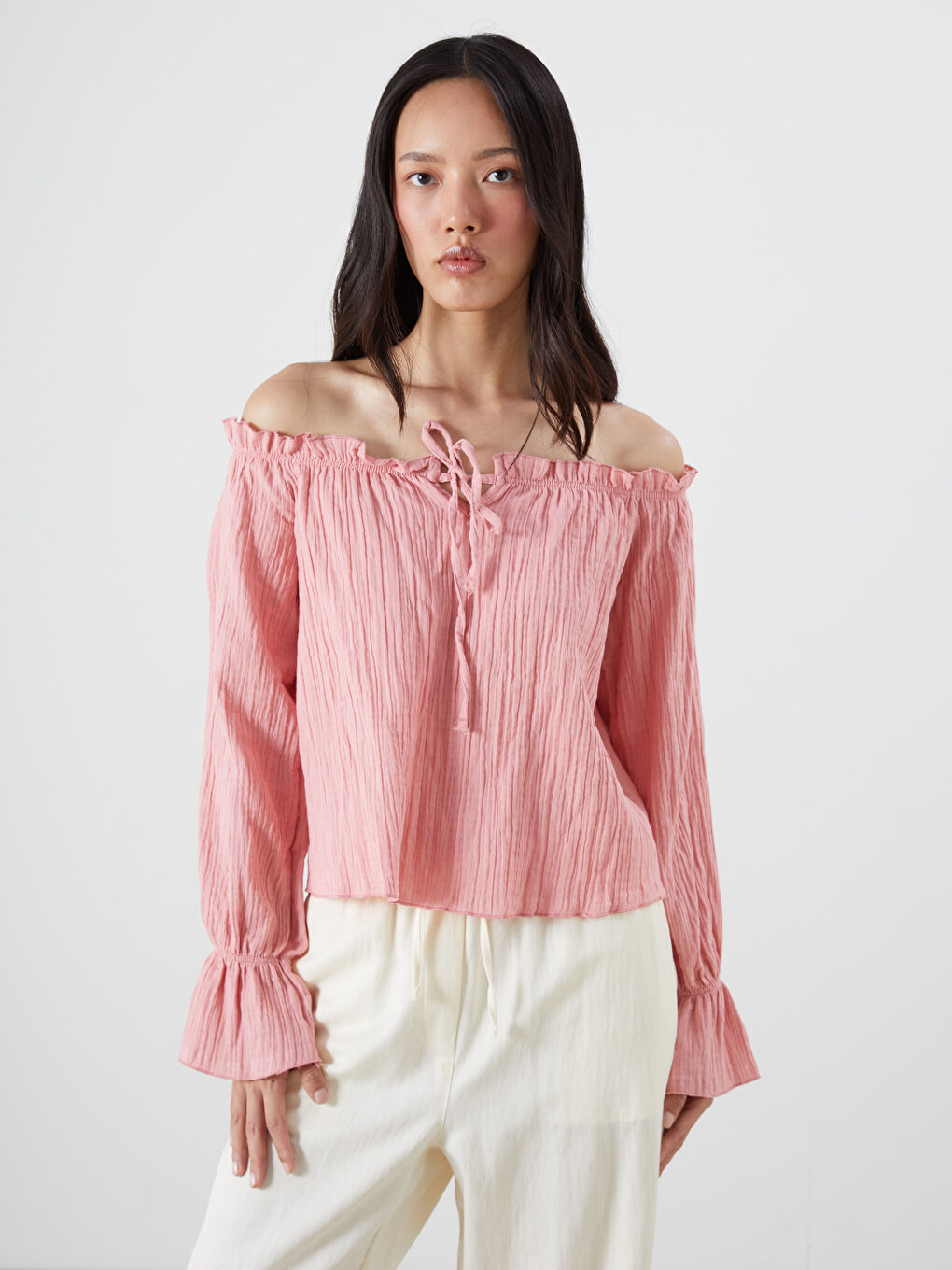 Pembe Bağlamalı Yaka Dokulu Oversize Müslin Bluz