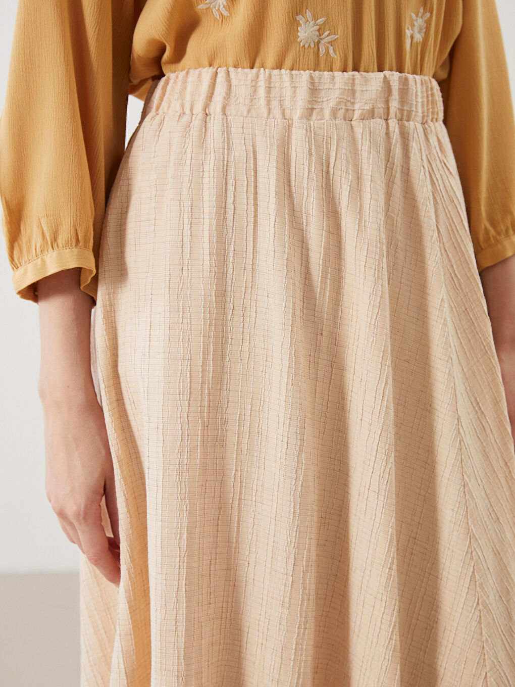 Bej Beli Lastikli Dokulu A Kesim Etek-2