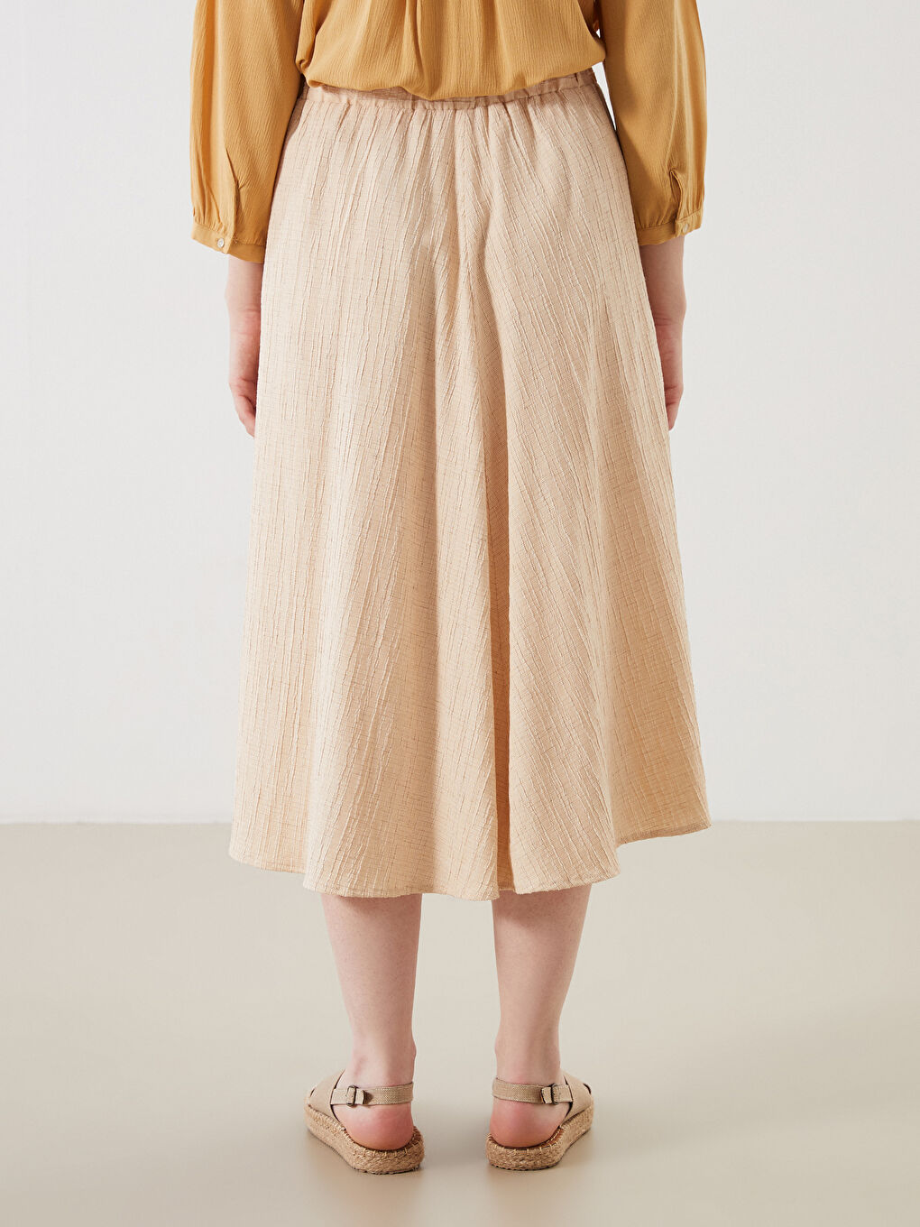 Bej Beli Lastikli Dokulu A Kesim Etek-3