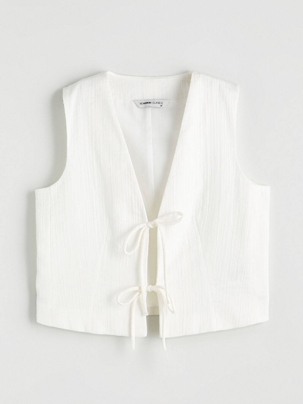 Beyaz V Yaka Dokulu Fiyonklu Kadın Klasik Yelek-4