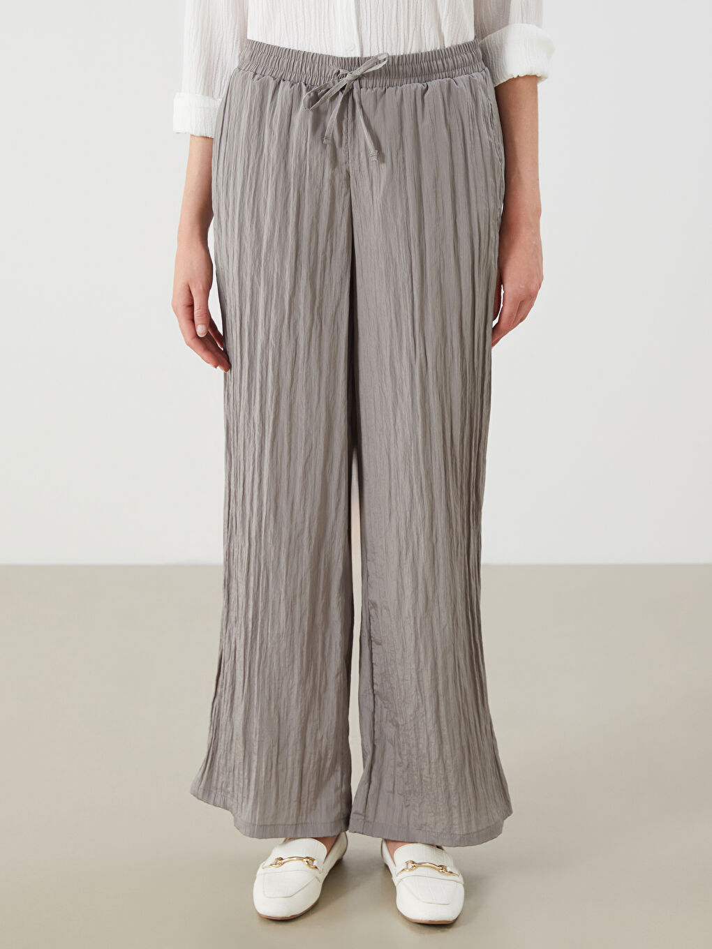 LCWAIKIKI Classic Elasticated Waist Textured Wide Leg Women's Trousers -S5RG04Z8-10O