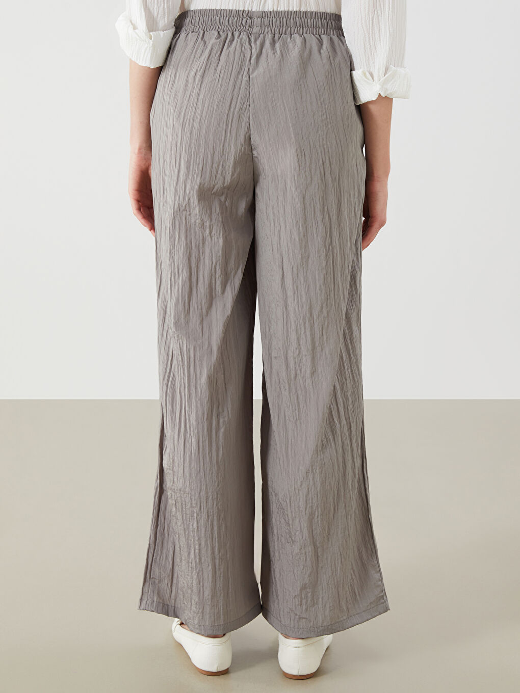 LCWAIKIKI Classic Elasticated Waist Textured Wide Leg Women's Trousers -S5RG04Z8-10O