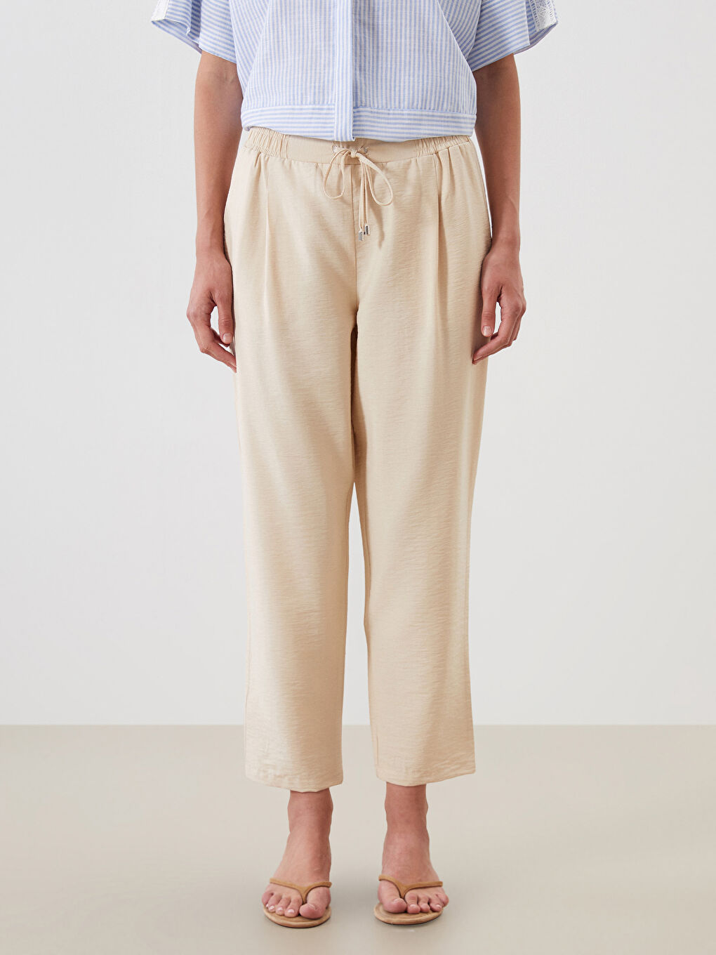 Bej Beli Lastikli Havuç Kesim Kadın Pantolon-1