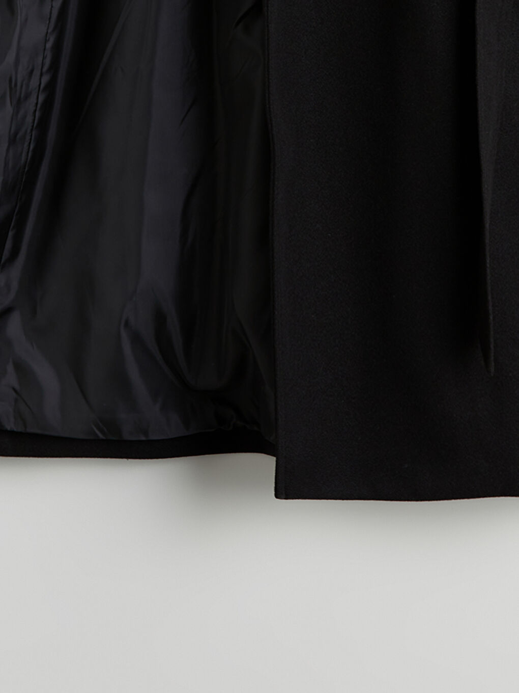 پۆشاکی سەرەوەی پشمی تێکەڵاو ڕه‌ش ژن-6