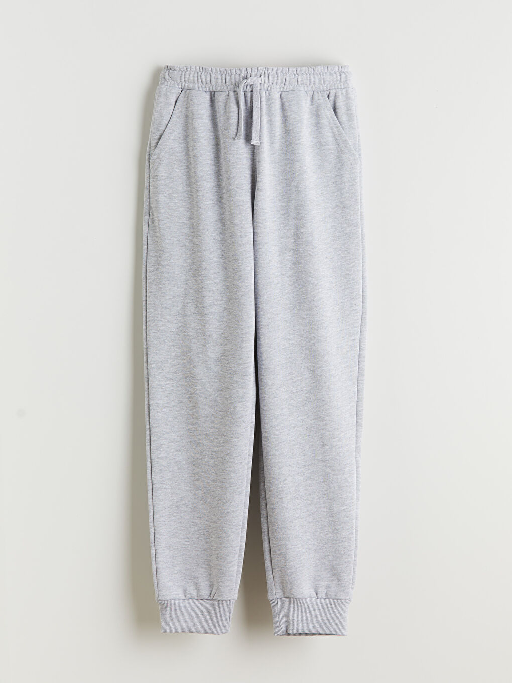 پانتۆڵی ئارەقەی کەمەر لاستیکی بۆ کوڕان ئه‌ستوور