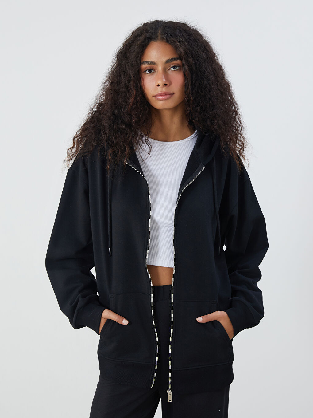 سويت شيرت بسحاب أوفرسايز بكابوش للسيدات