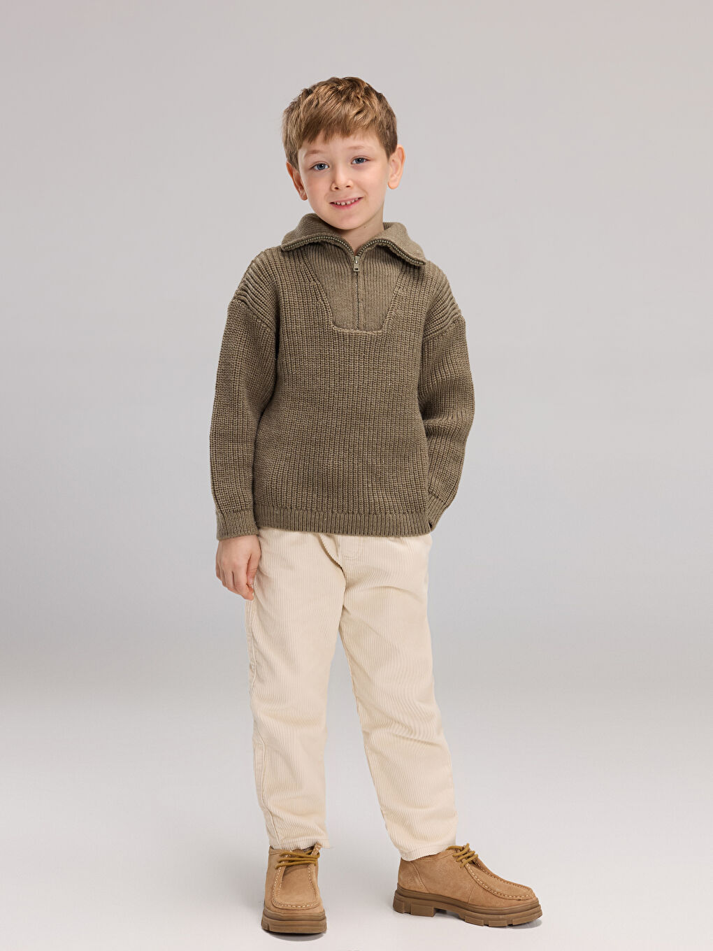 بلوزی تریکۆیه‌کی یەخەی مل بەرزی بۆ کوڕان-1