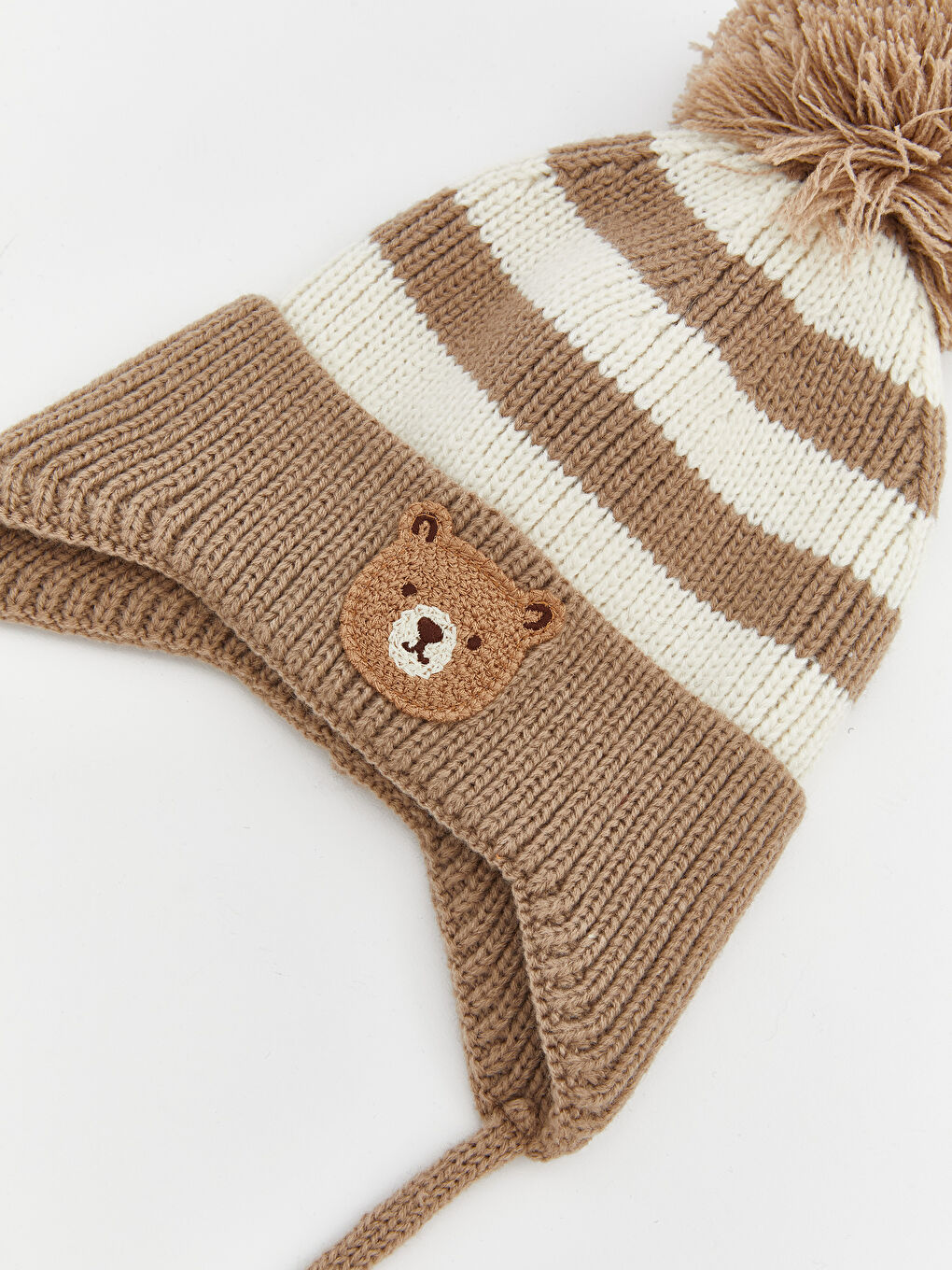 کڵاوی منداڵی تازەلەدایکبوو بۆ کوڕان بە وردەی پۆمپۆم-2