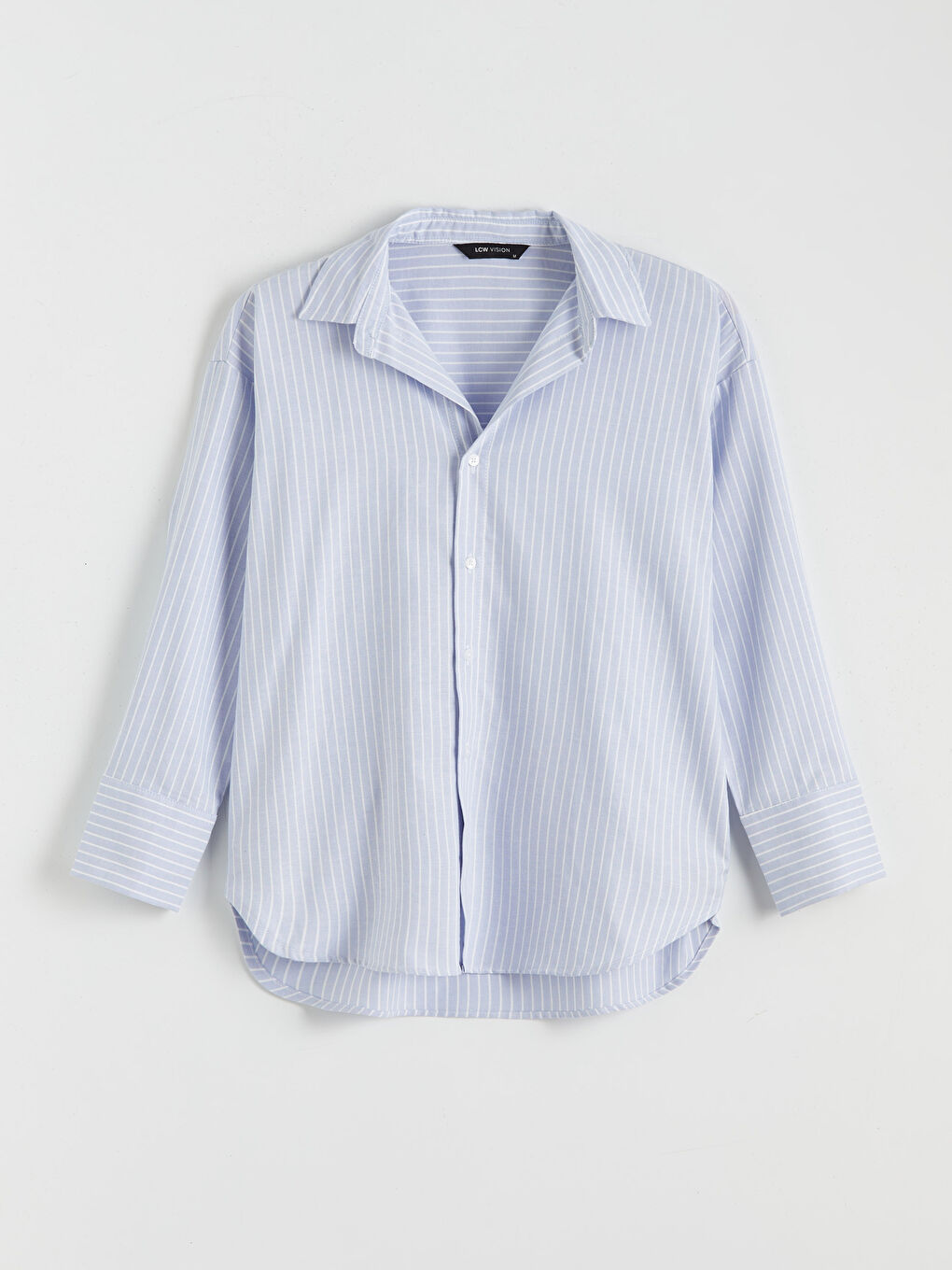 قميص مُخَطَّط واسع الحجم للسيدات