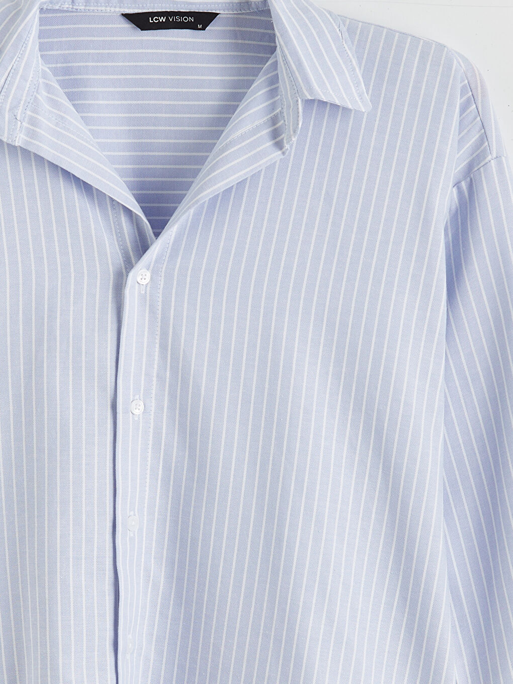 قميص مُخَطَّط واسع الحجم للسيدات-1