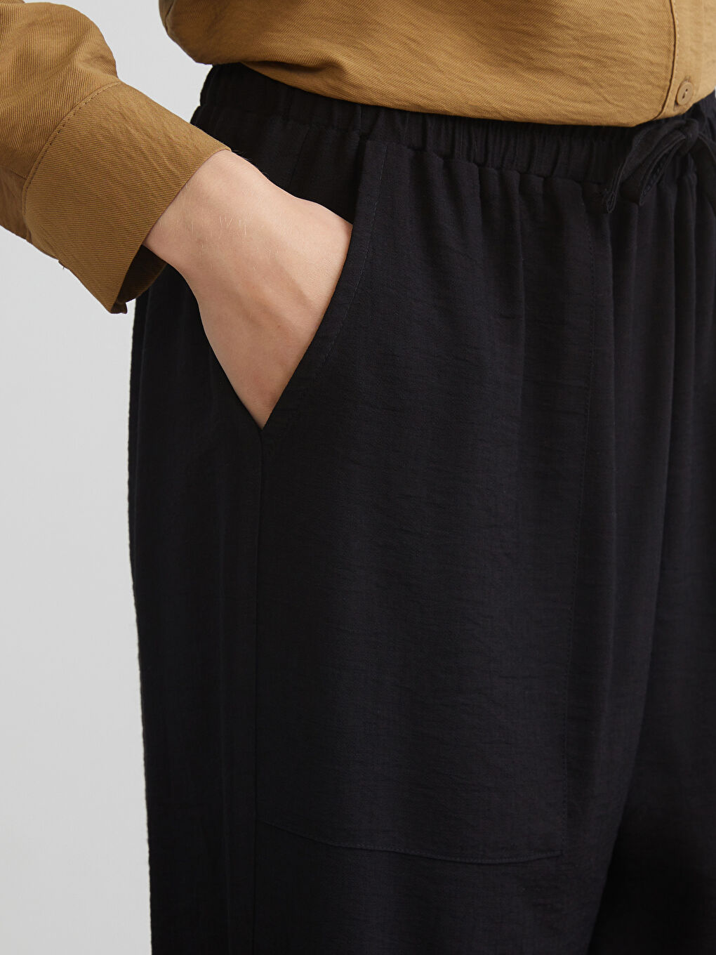 Әйелдерге арналған серпімді белдік сәбіз тәрізді пішім шалбар-4