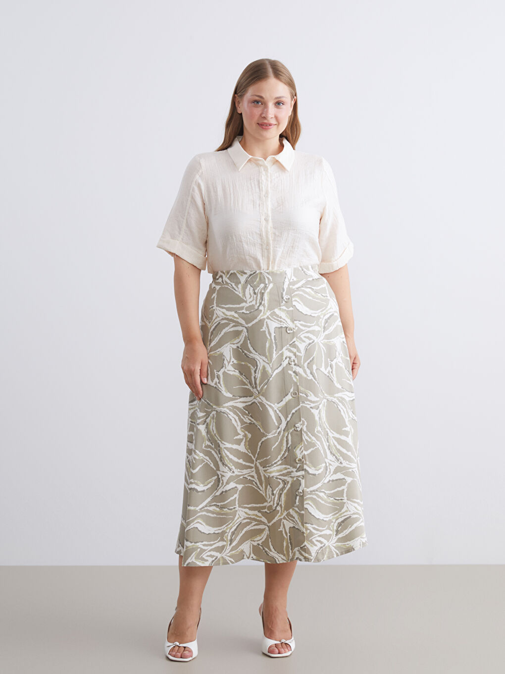 جيبة على شكل حرف A منقوشة بخصر مرن-1