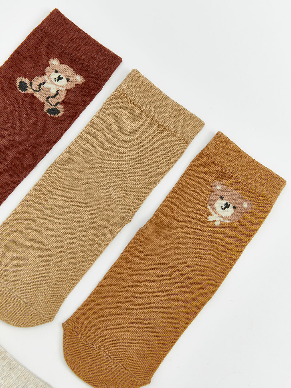 گۆرەوی ئەژنۆ قاوه‌یی کوڕی ساوا-1