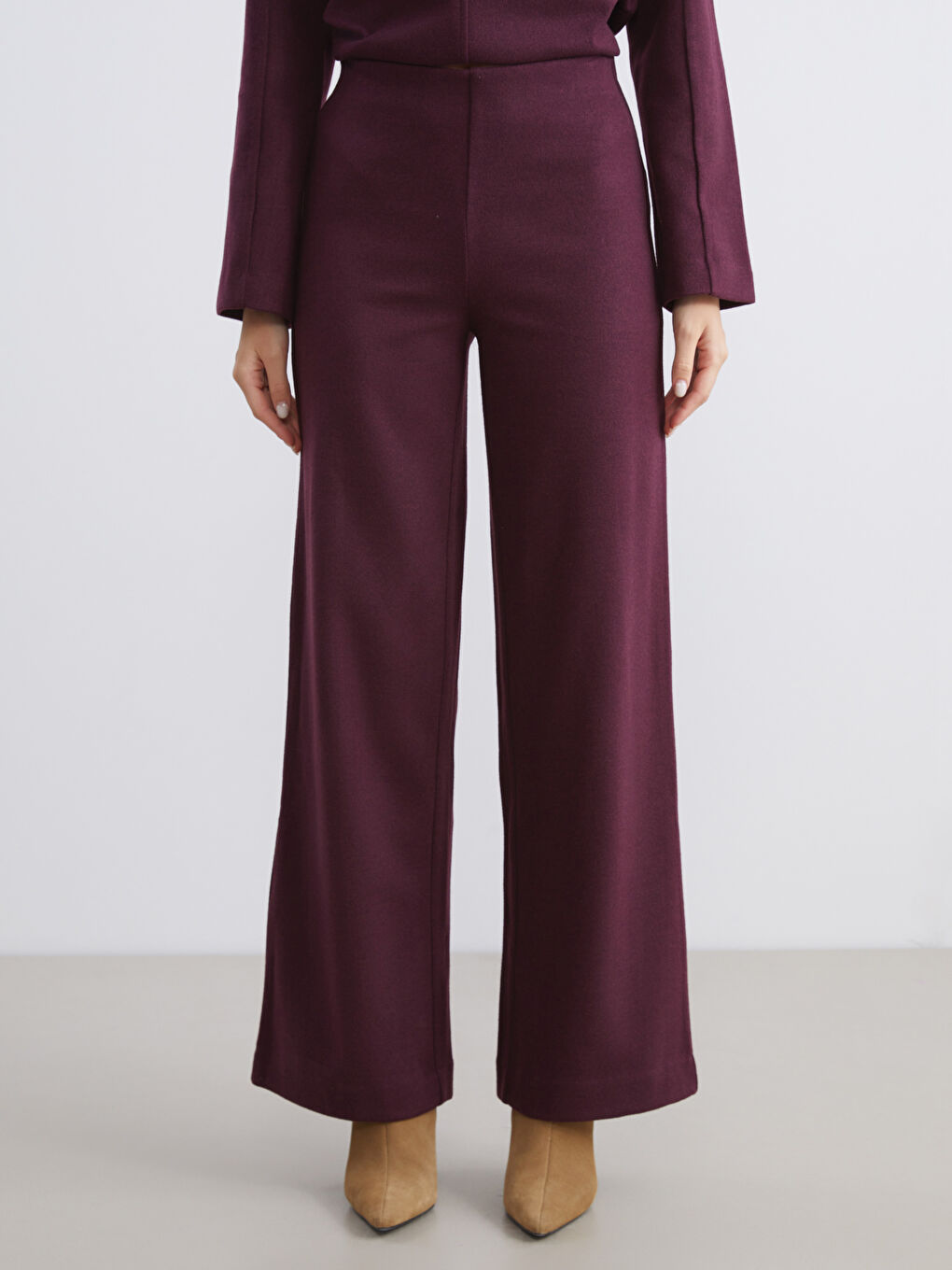 Pantalone sa elastičnim strukom i širokim nogavicama za žene-1