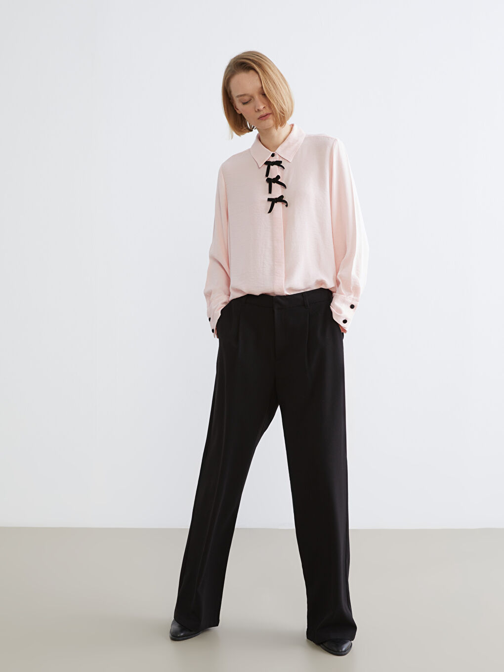 قميص وردي امرأة-1