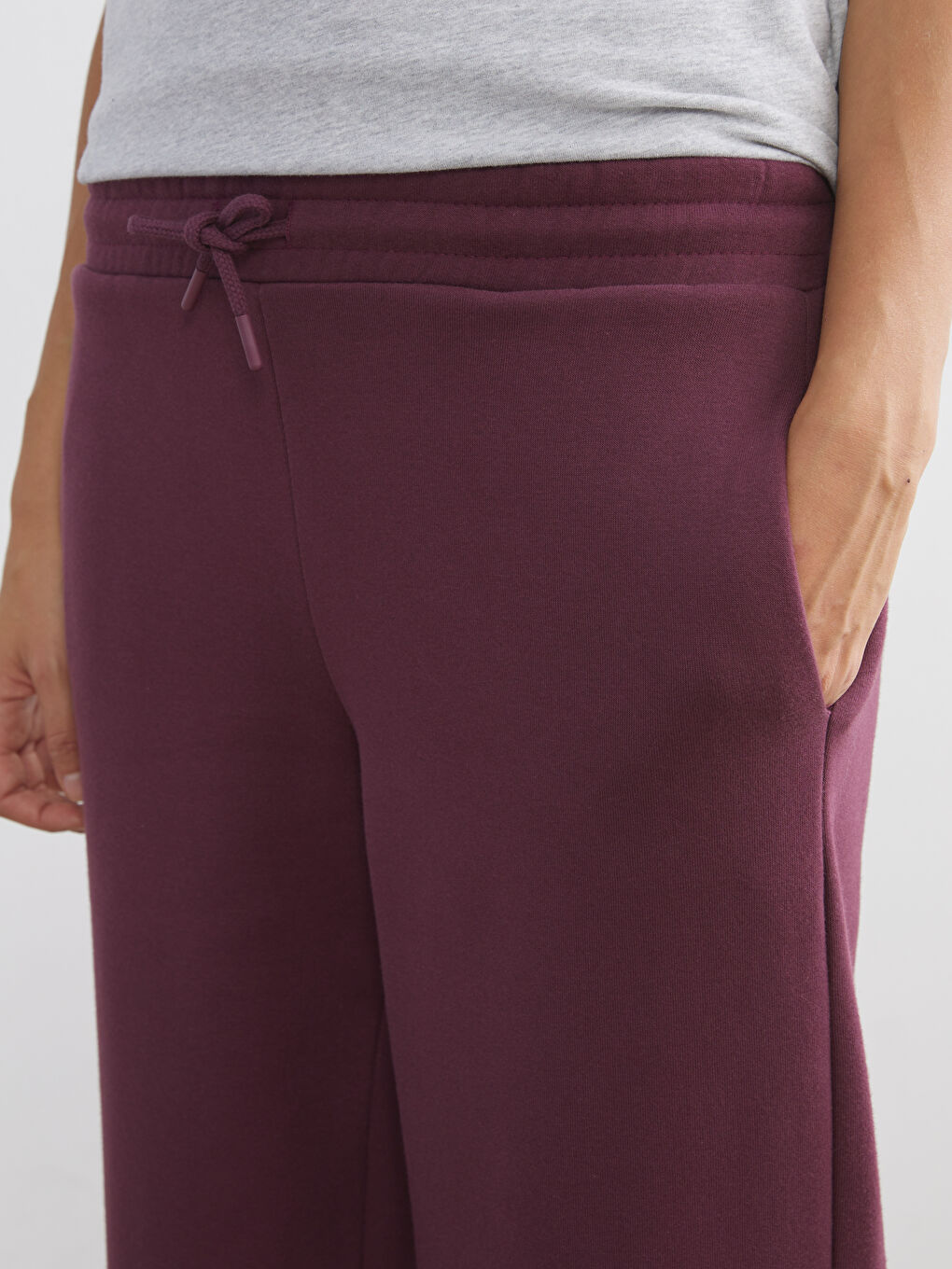 پانتۆڵی ئارەقەی قەبارەی ناوەند بۆ ژنان بە کەمەر لاستیک-2