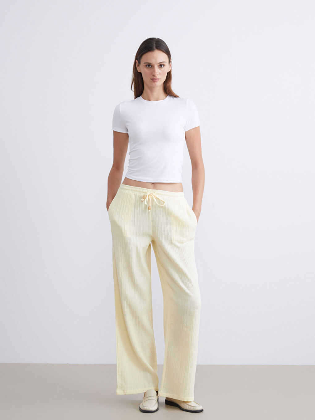 Sarı Beli Lastikli Dokulu Müslin Kadın Pantolon