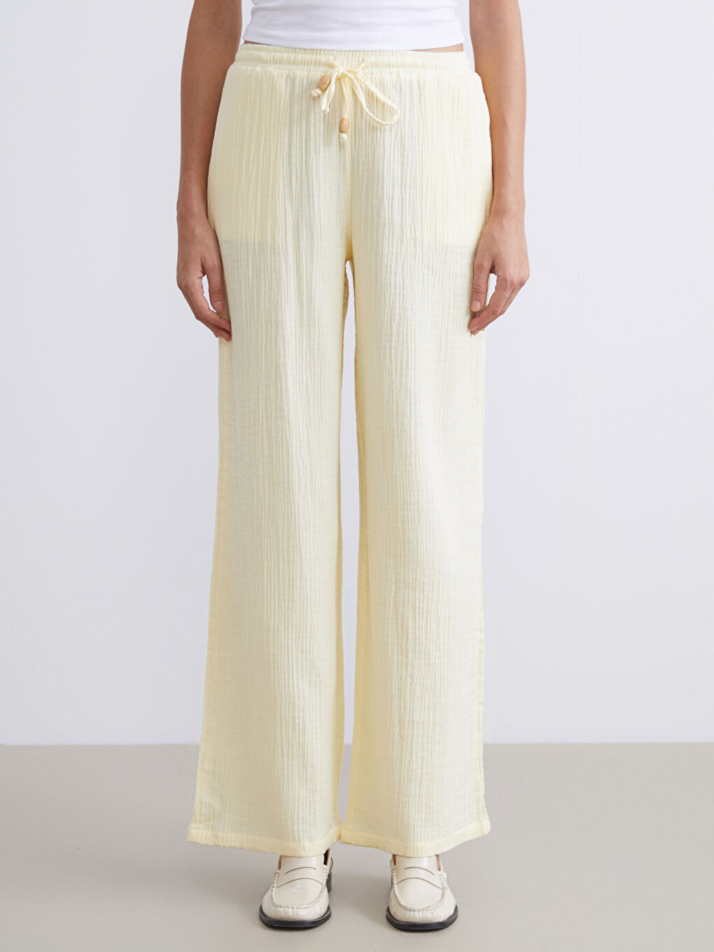 Sarı Beli Lastikli Dokulu Müslin Kadın Pantolon-1