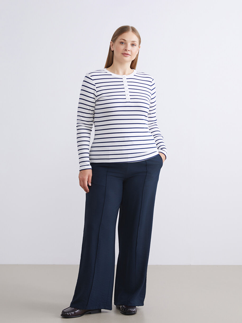 Pantalone sa elastičnim strukom i širokim nogavicama za žene-1