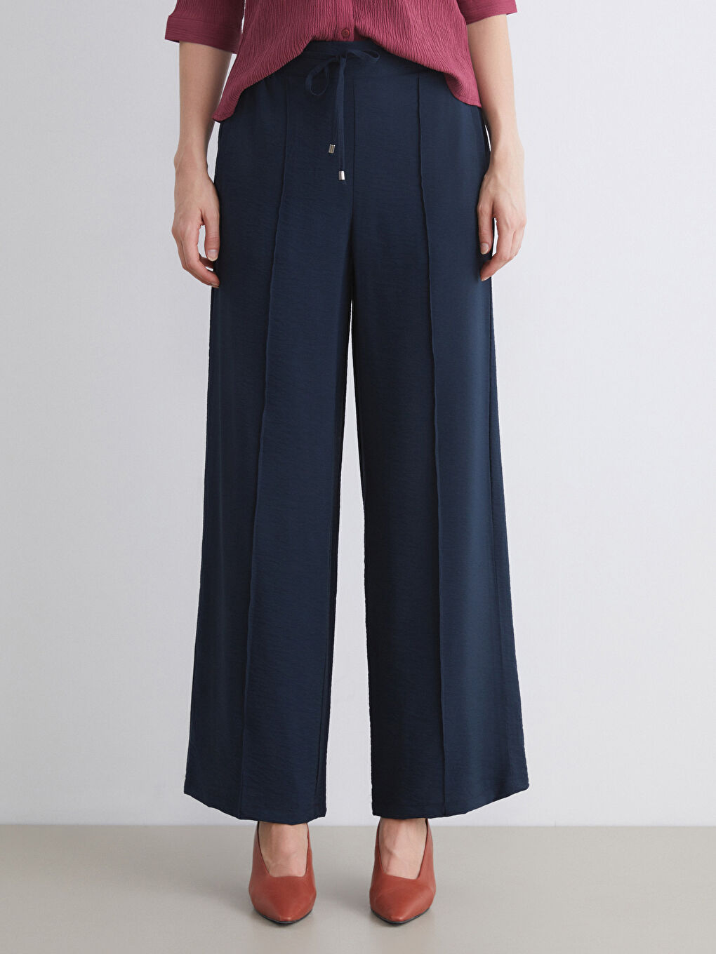 Pantalone sa elastičnim strukom i širokim nogavicama za žene-2