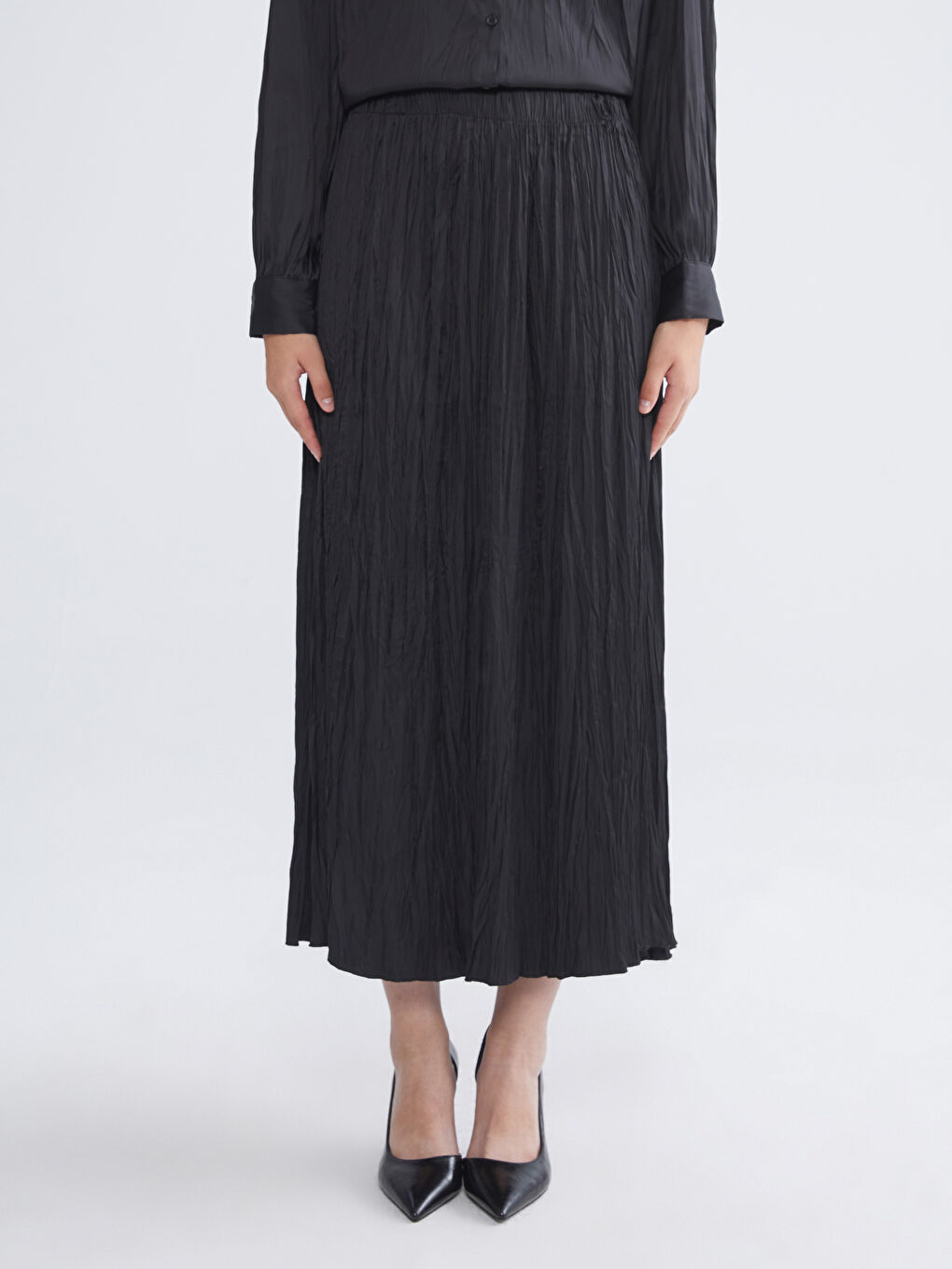 Siyah Beli Lastikli Saten Pileli Etek-1