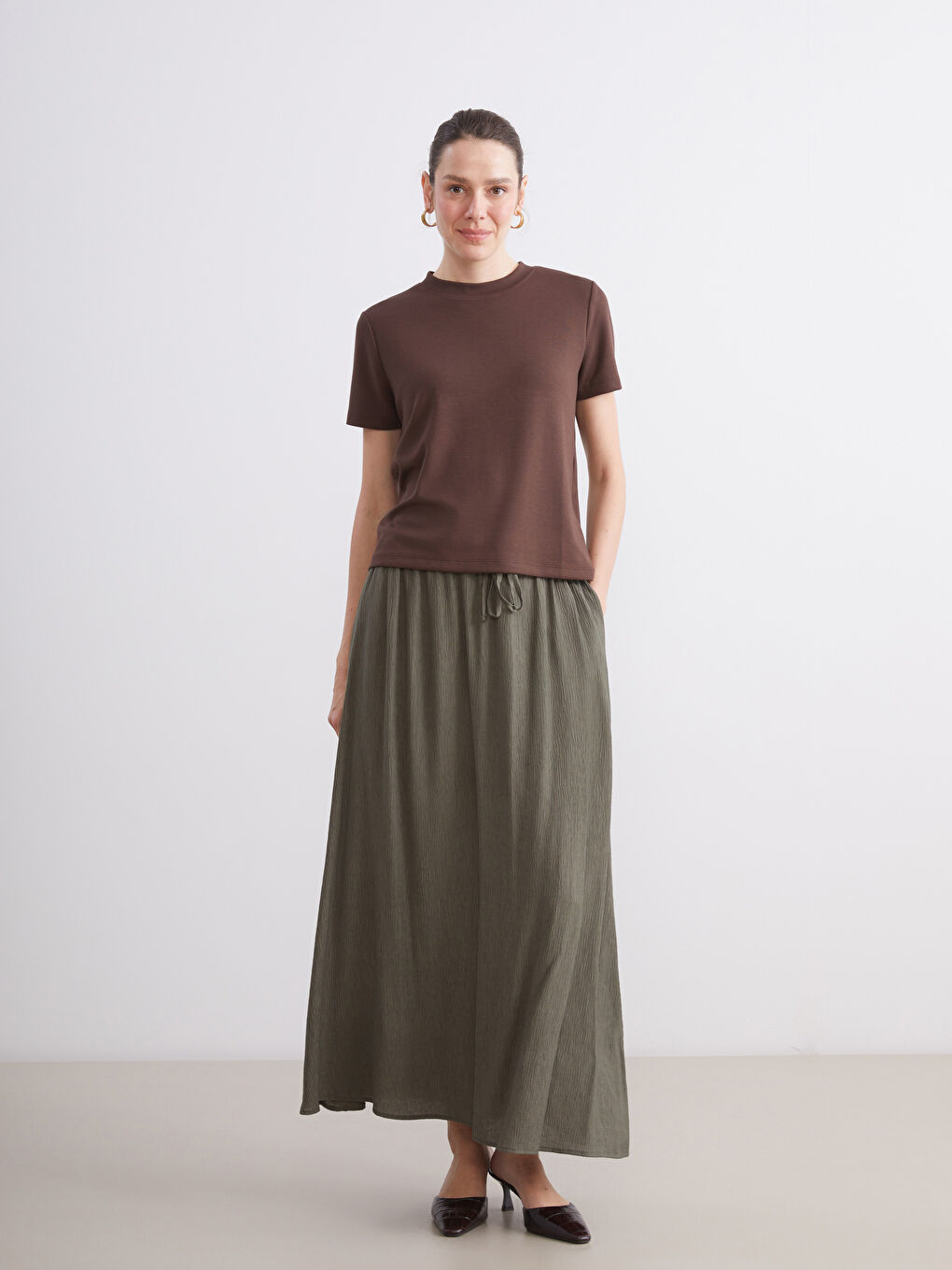 Haki Beli Lastikli Dokulu Kloş Etek